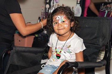 This is a photo a girl with face painting at the 2024 Kissimmee Juneteenth Festival.
