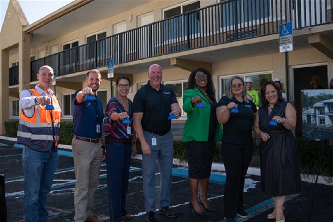 Photo of City of Kissimmee staff celebrating kick off to Haven on Vine project. 